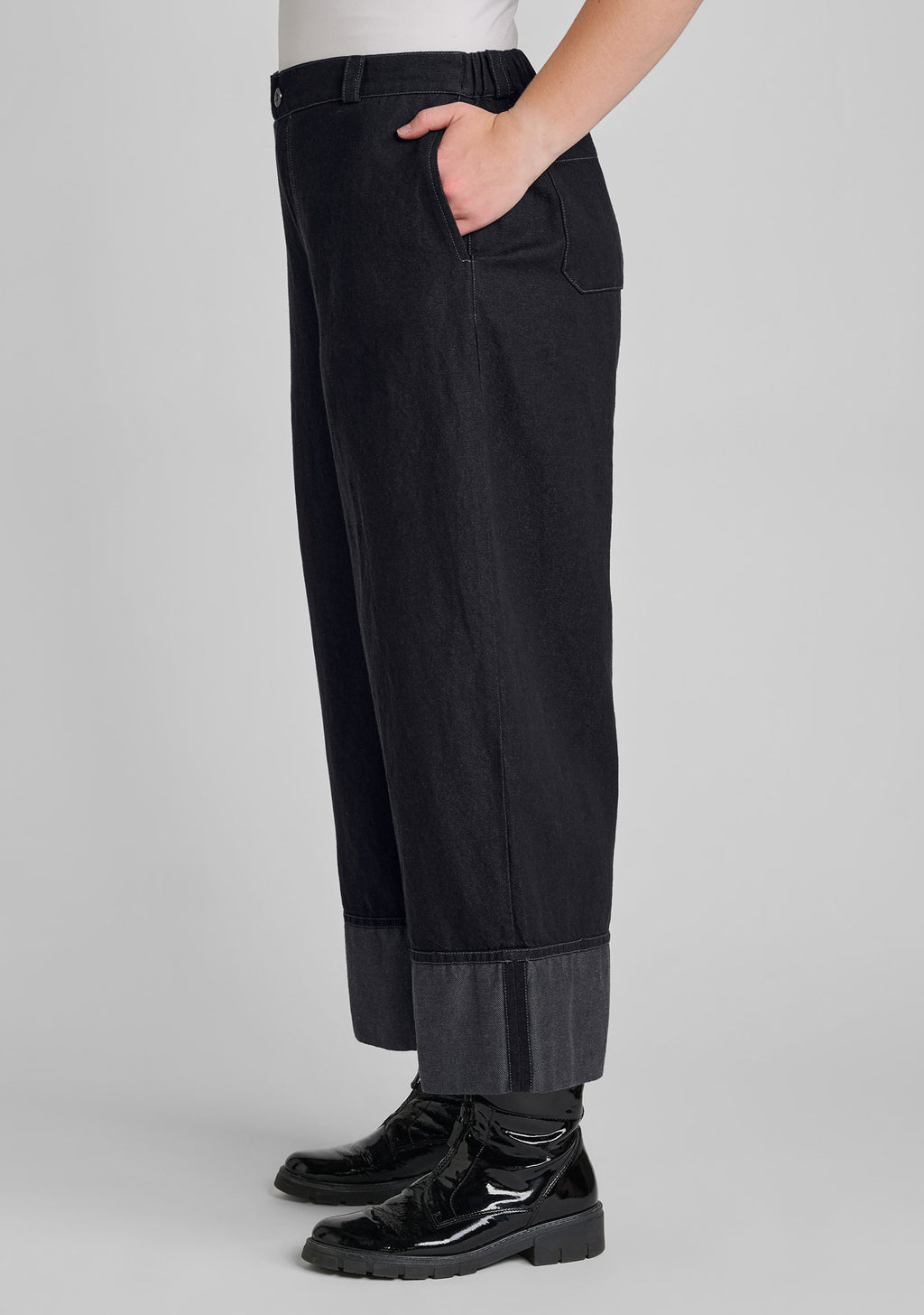 side view of wide leg pants with hand in pocket