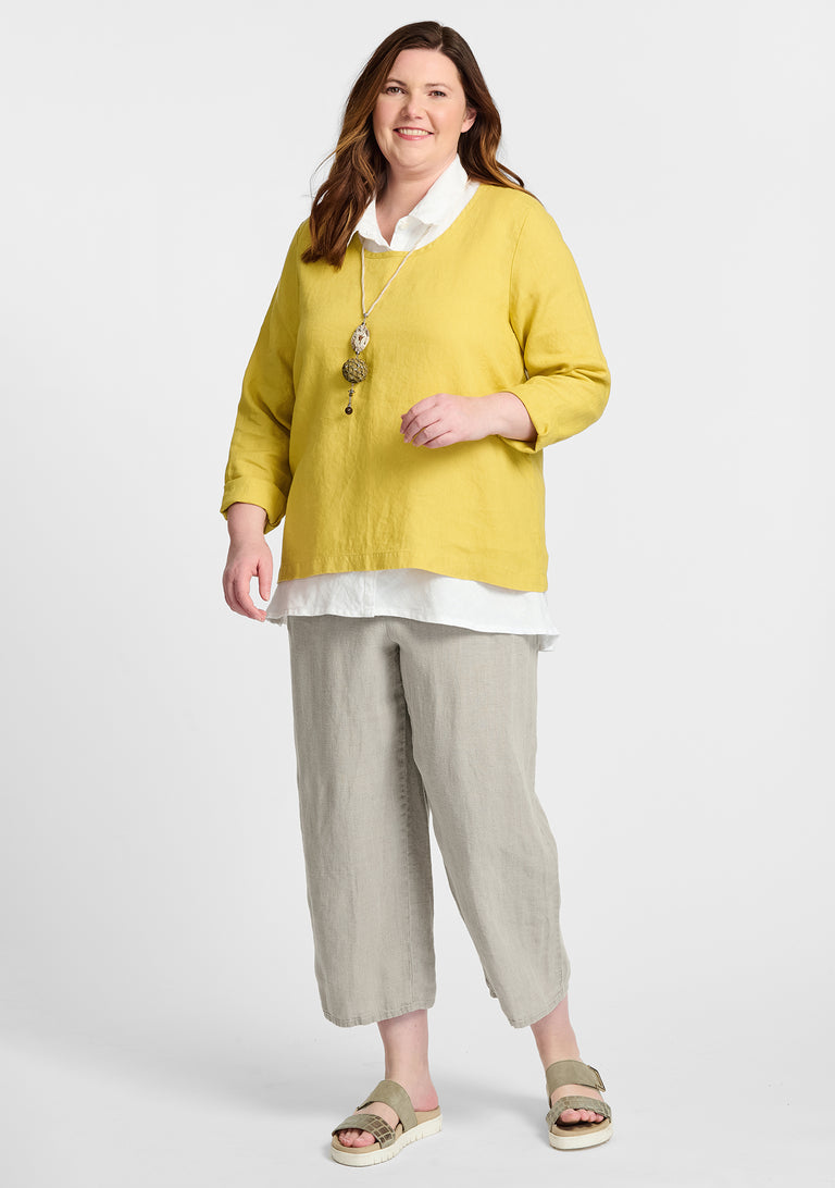 FLAX linen shirt in yellow with linen blouse in white and linen pants in natural